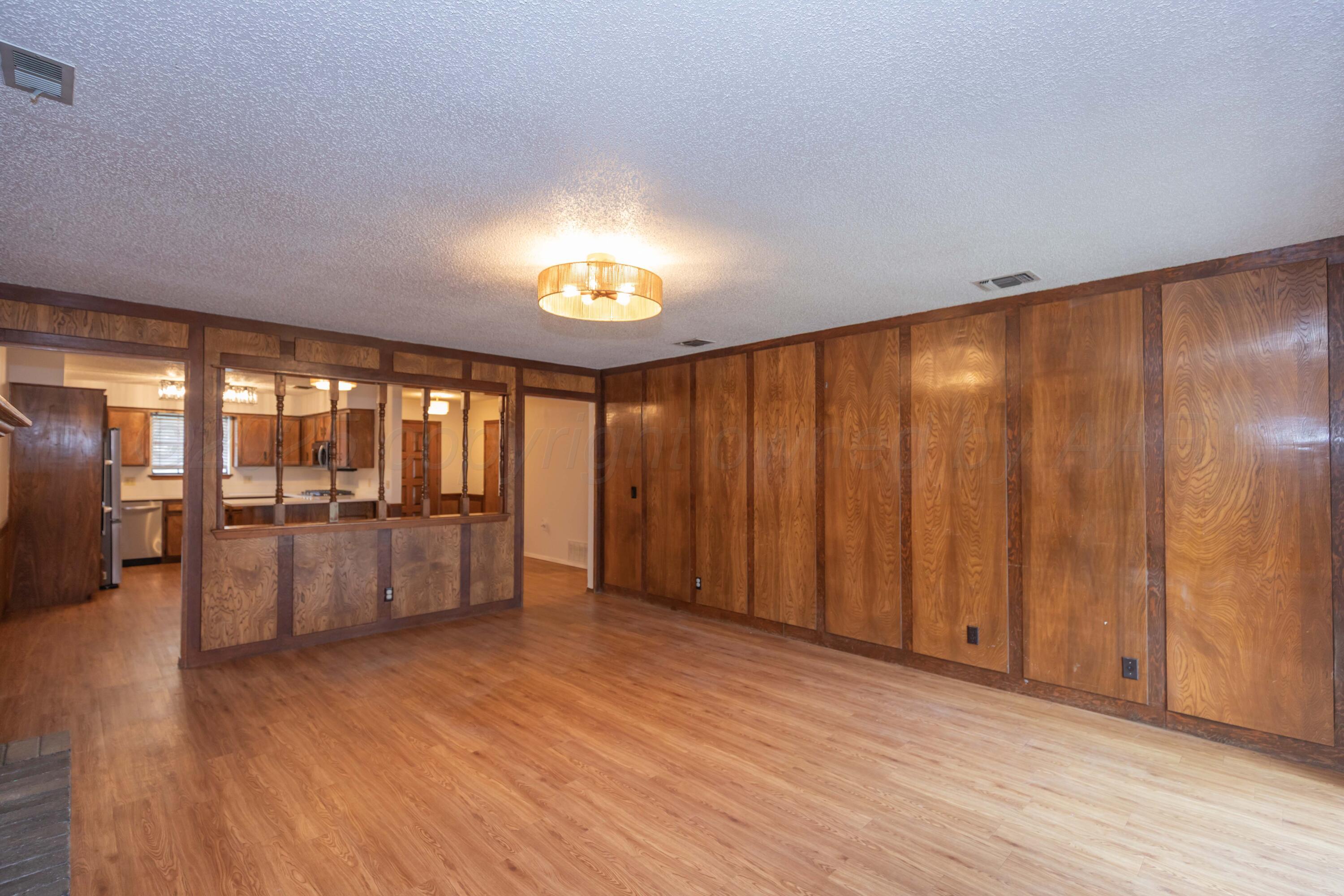 5312 Hillside Road Amarillo, TX 79109 - Photo 8 of 43 LIVING ROOM VIEW 3