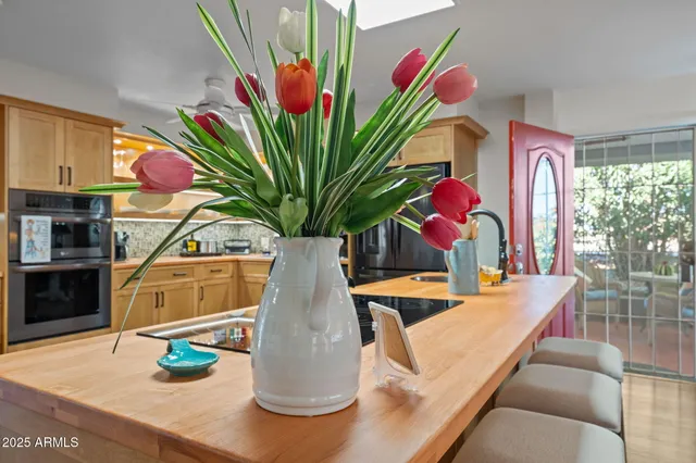 a view of living room with furniture and flower pot