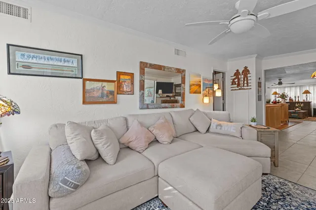 a living room with furniture and a couch