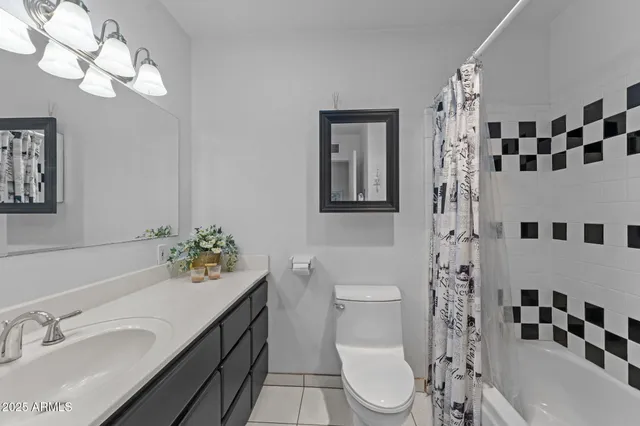a view of storage and utility room with washer and dryer