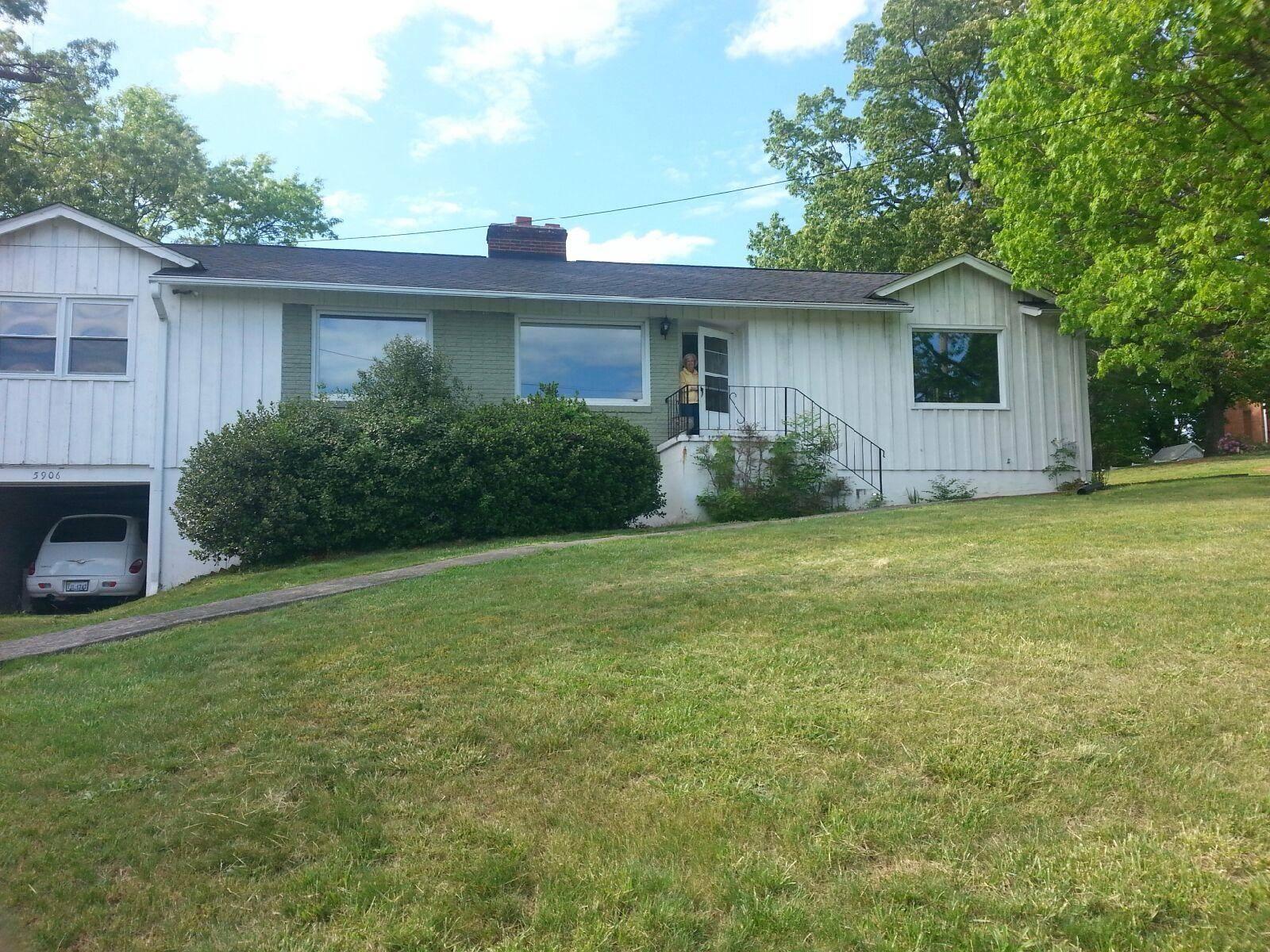 5906 Cove Road Roanoke, VA 24019 - Photo 1 of 8 a view of a house with a yard and potted plants