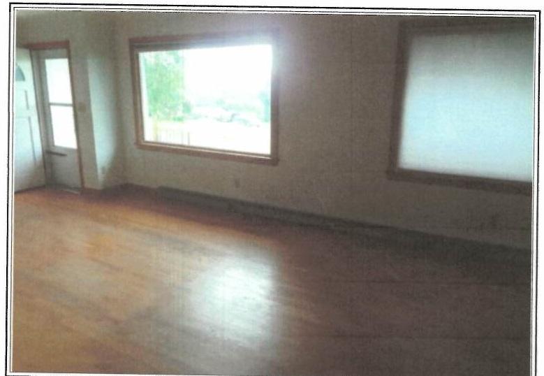 5906 Cove Road Roanoke, VA 24019 - Photo 2 of 8 an empty room with a window
