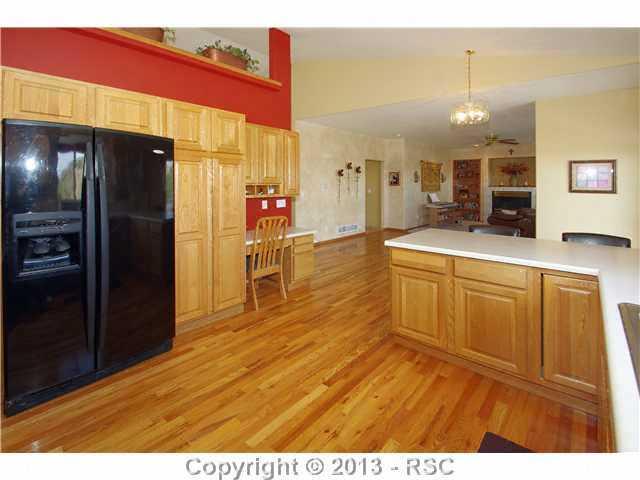 7780 Julynn Road Colorado Springs, CO 80919 - Photo 8 of 25 Kitchen Looking Toward Living Room