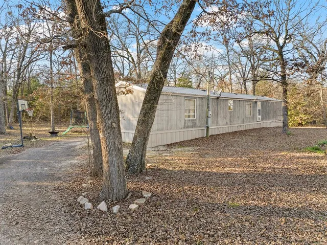a view of lake with green space