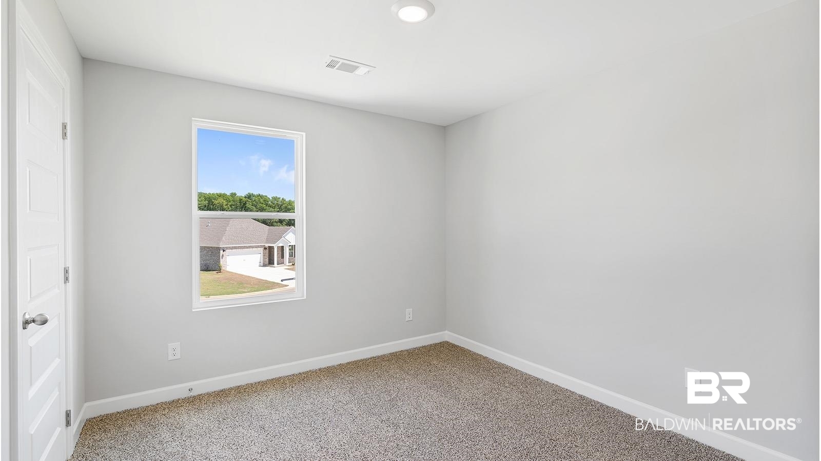 30567 Asheville Road Daphne, AL 36527 - Photo 24 of 29 Empty room featuring baseboards and carpet flooring