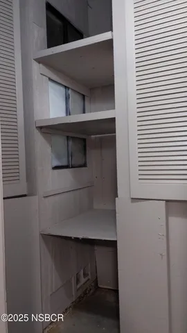 a view of storage and utility room