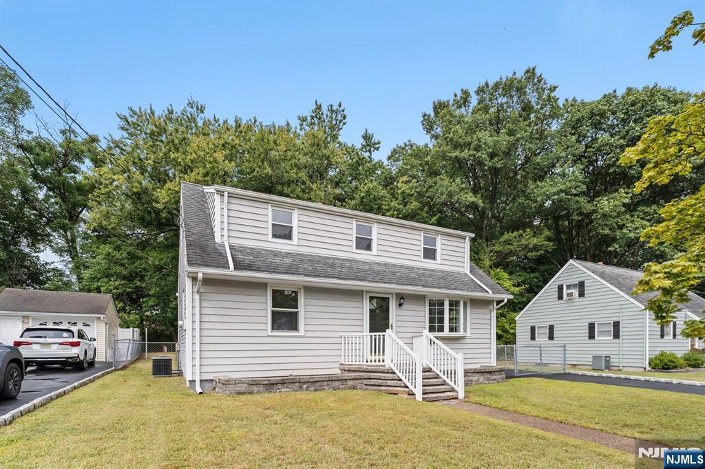 18 Farmingdale Avenue Bloomfield, NJ 07003 - Photo 2 of 50 a front view of a house with garden