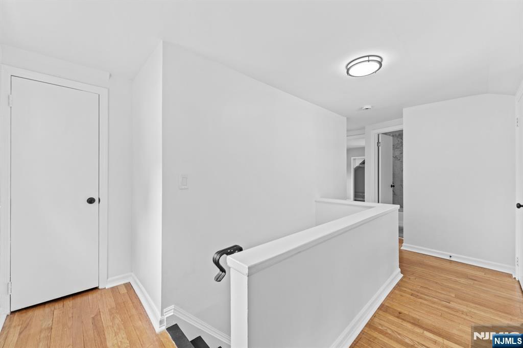18 Farmingdale Avenue Bloomfield, NJ 07003 - Photo 22 of 50 a view of hallway with wooden floor