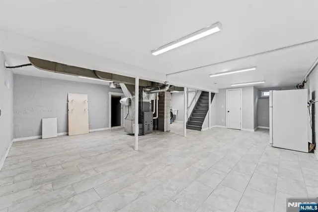 a view of an empty room with closet