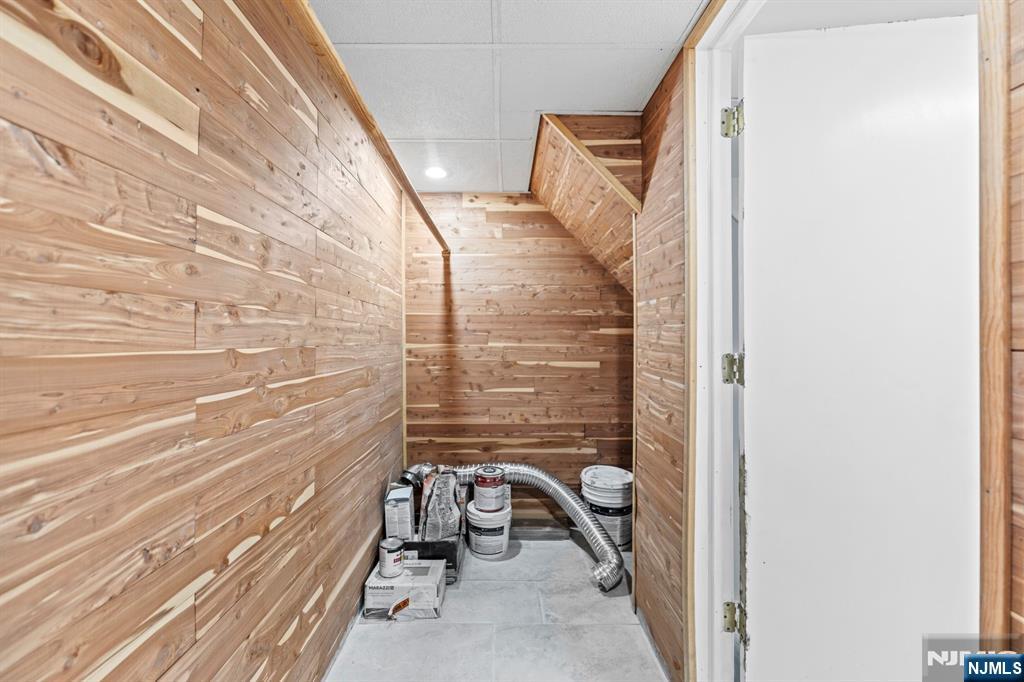 18 Farmingdale Avenue Bloomfield, NJ 07003 - Photo 32 of 50 a bathroom with a sink and a mirror