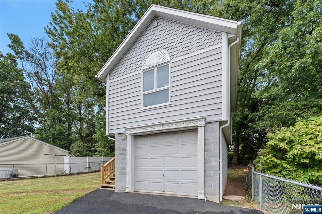 18 Farmingdale Avenue Bloomfield, NJ 07003 - Photo 35 of 50 a view of house that has a small yard