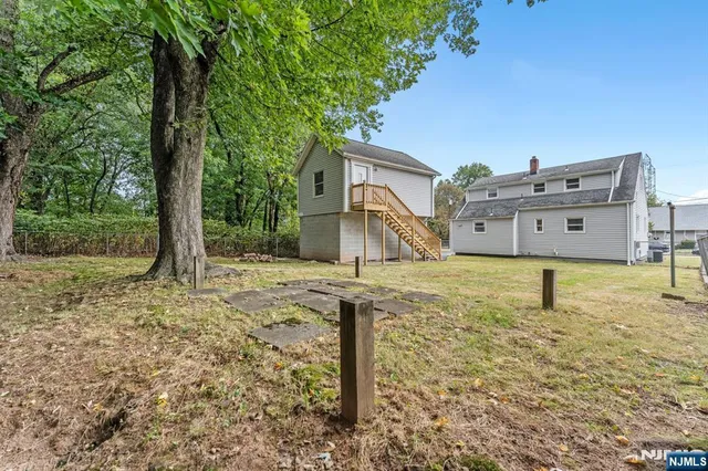 a house view with a backyard