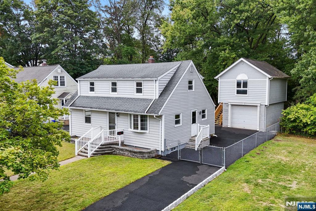 18 Farmingdale Avenue Bloomfield, NJ 07003 - Photo 4 of 50 a aerial view of a house with swimming pool in front of it