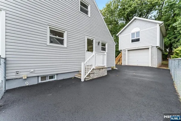 a view of a house with a garage