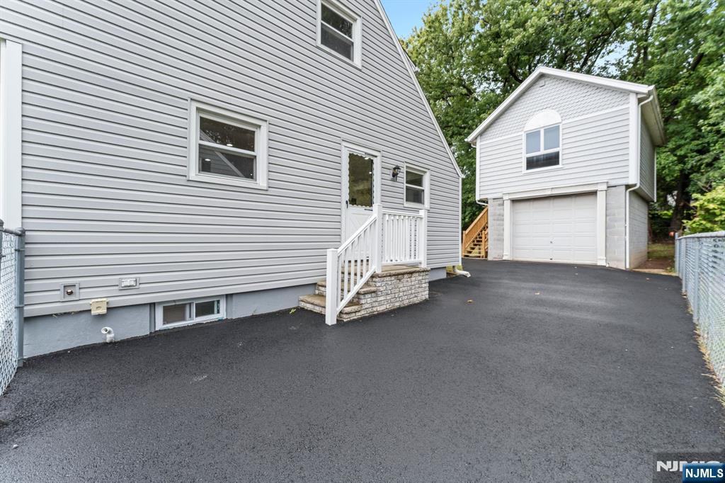 18 Farmingdale Avenue Bloomfield, NJ 07003 - Photo 5 of 50 a view of a house with a garage