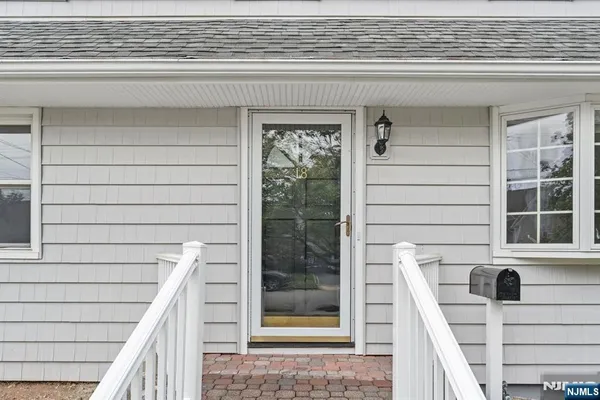 a view of balcony with wooden floor and stairs