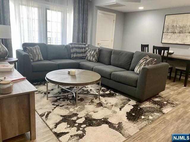 a living room with a couch and a table