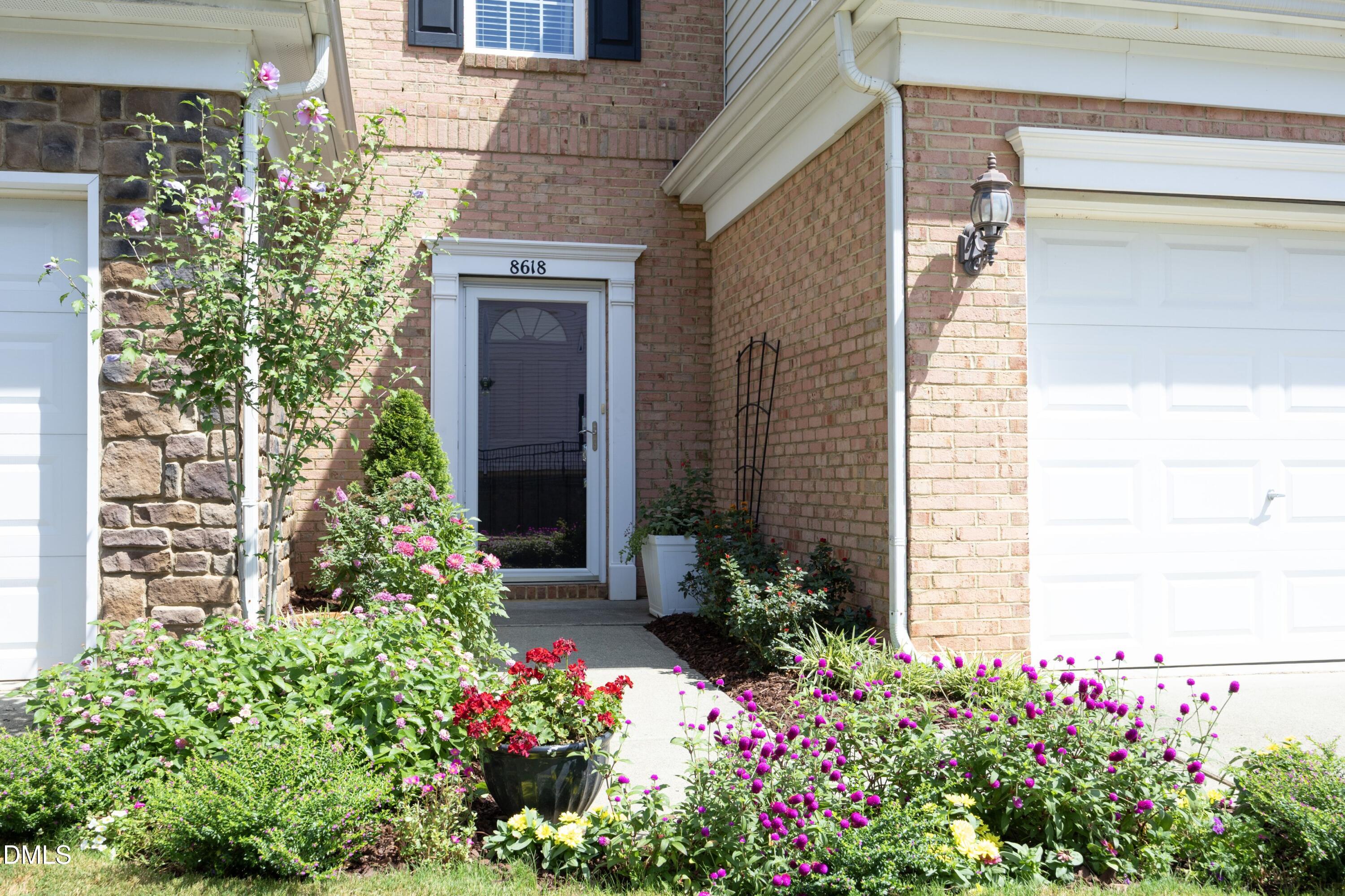 8618 Redcrest Place Raleigh, NC 27617 - Photo 2 of 30 Beautifully Landscaped