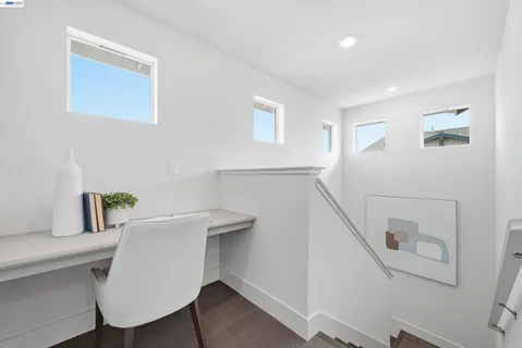 a utility room with sink dryer and washer