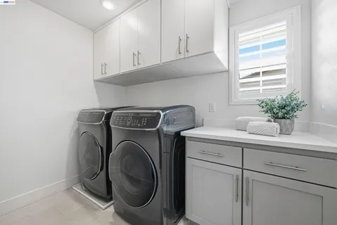 an aerial view of a house with yard swimming pool and outdoor seating