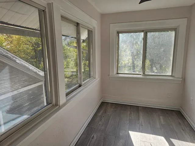 a view of a room that has a window in it