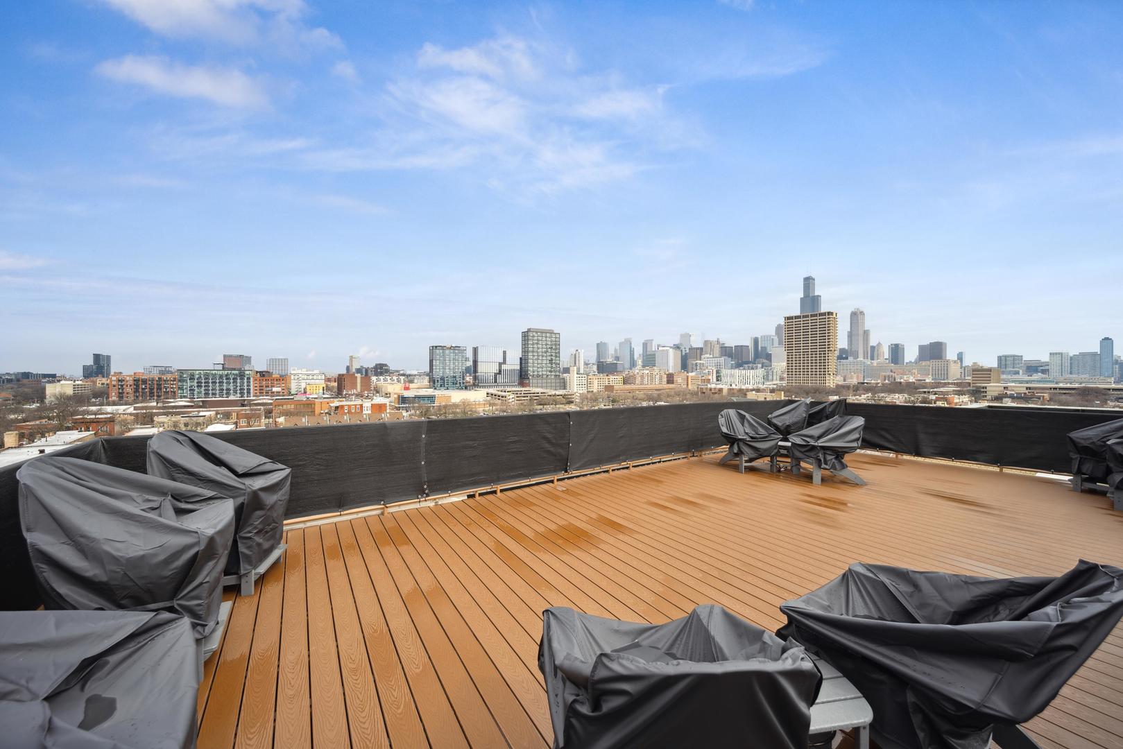 811 South Lytle Street, Unit 510 Chicago, IL 60607 - Photo 26 of 26 a view of a roof deck with lounge chairs