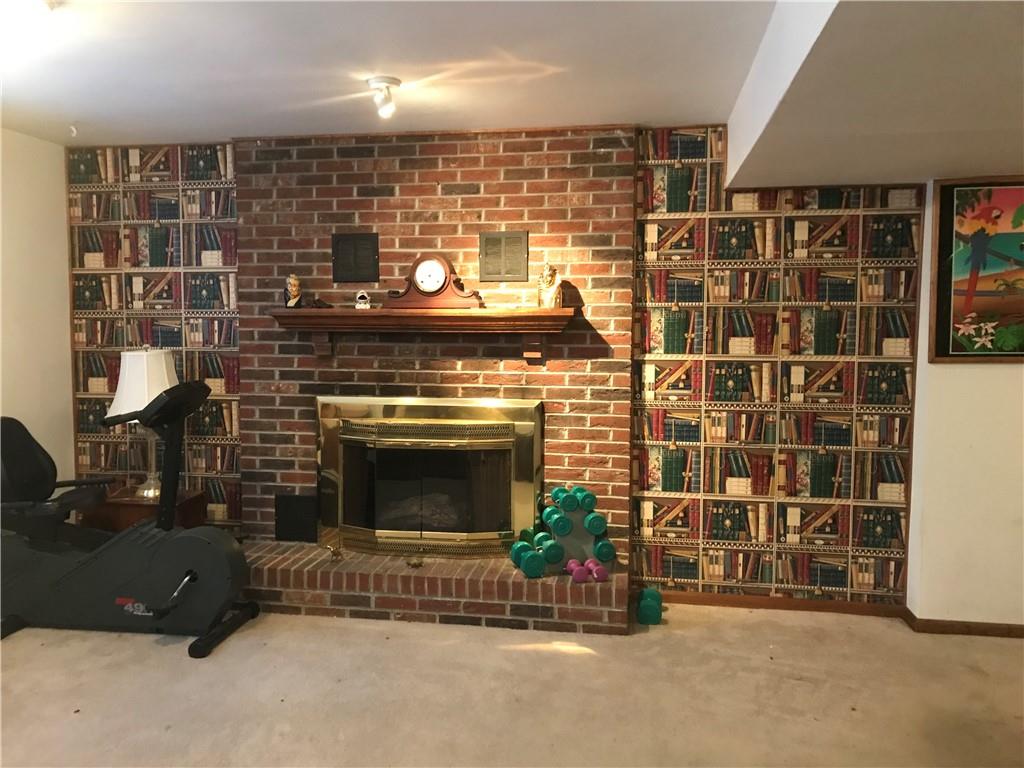 204 Fairview Drive Irwin, PA 15642 - Photo 11 of 12 a room with fireplace and windows