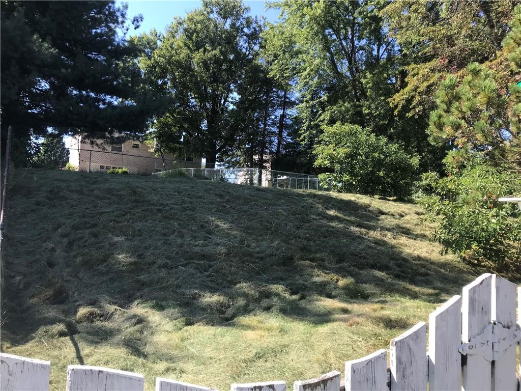 204 Fairview Drive Irwin, PA 15642 - Photo 3 of 12 a view of a yard with large trees