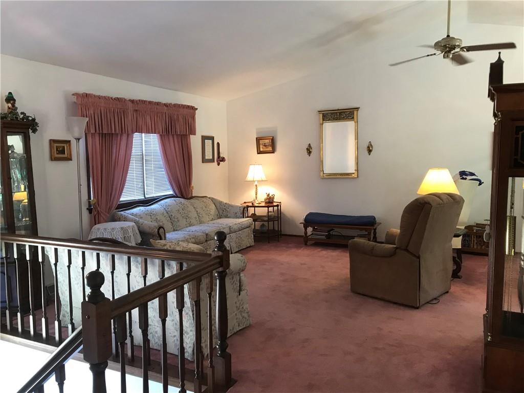 204 Fairview Drive Irwin, PA 15642 - Photo 5 of 12 a living room with furniture and a window