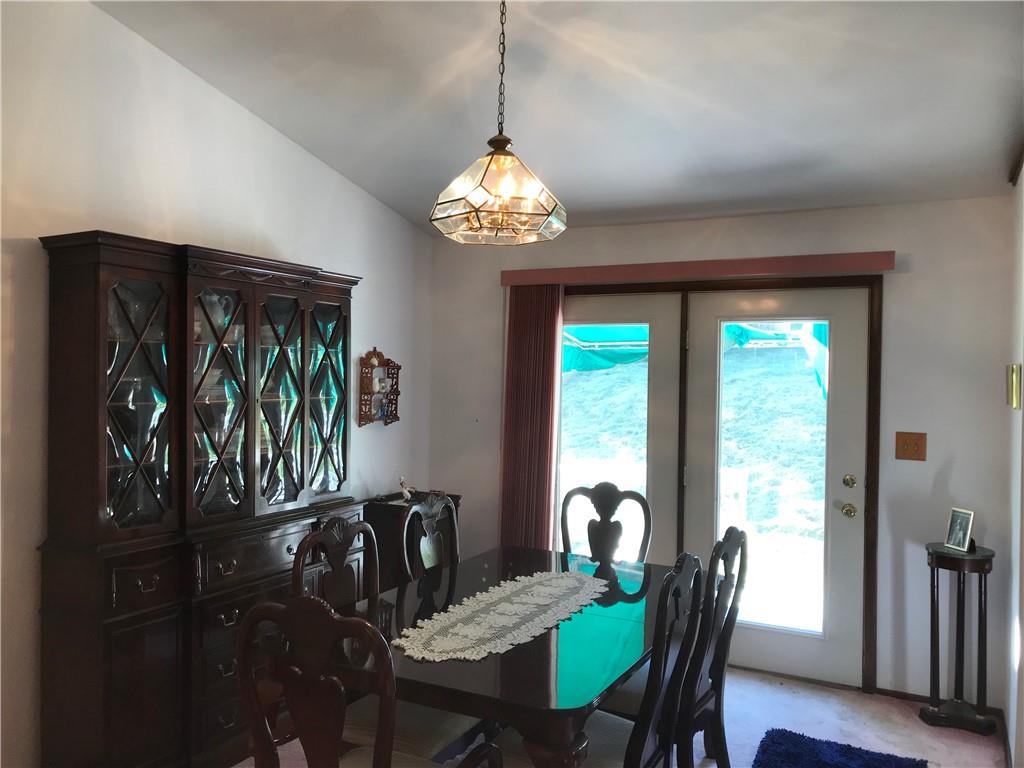 204 Fairview Drive Irwin, PA 15642 - Photo 6 of 12 a view of a dining room with furniture window and outside view