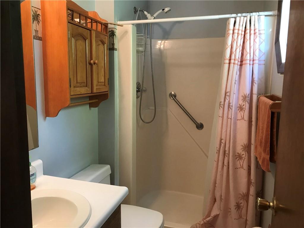 204 Fairview Drive Irwin, PA 15642 - Photo 10 of 12 a bathroom with a shower and toilet