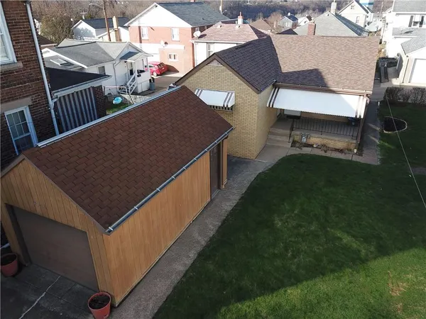 a terrace of a house with outdoor seating