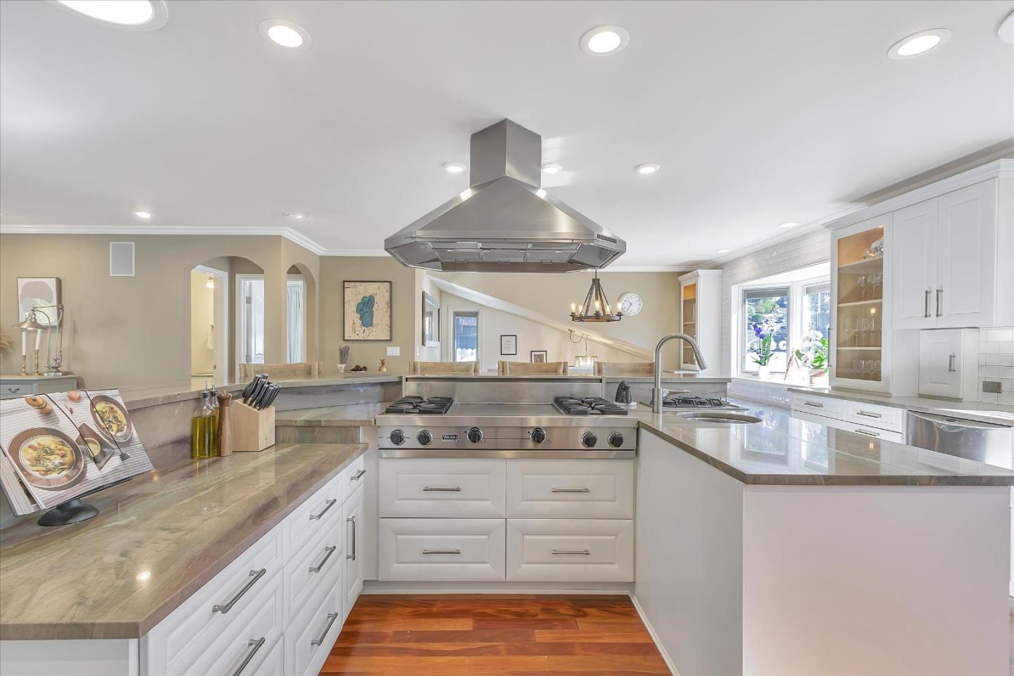 1261 Oddstad Boulevard Pacifica, CA 94044 - Photo 2 of 62 a kitchen with a sink stove and cabinets