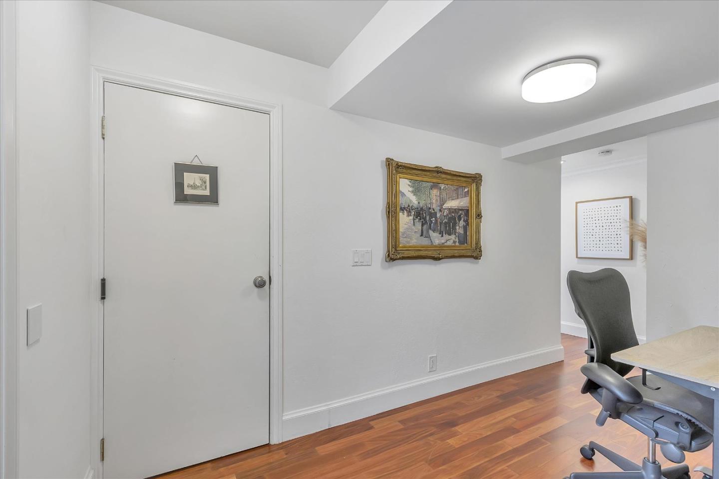 1261 Oddstad Boulevard Pacifica, CA 94044 - Photo 26 of 62 a view of a workspace with wooden floor and a workspace
