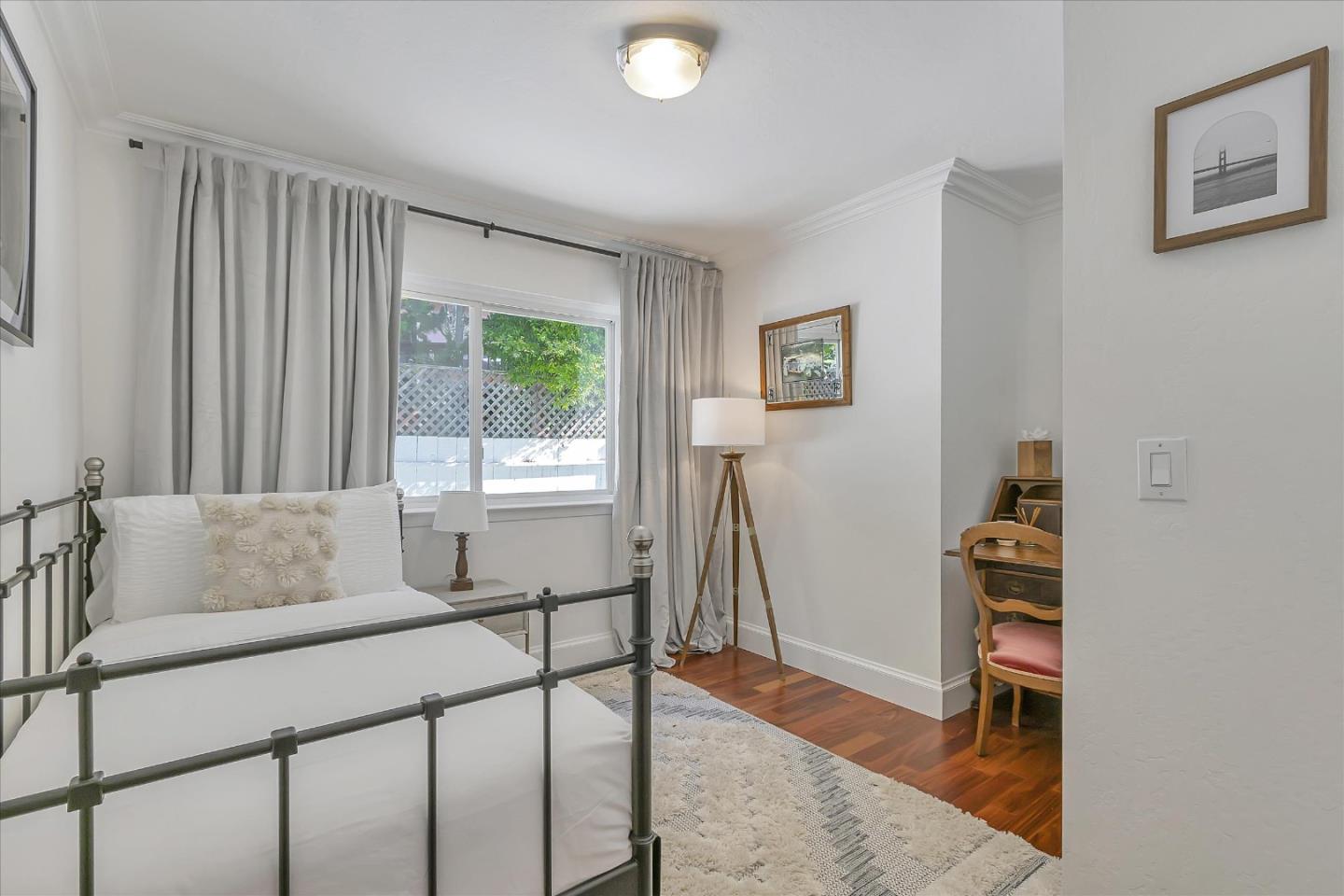 1261 Oddstad Boulevard Pacifica, CA 94044 - Photo 30 of 62 a living room with furniture and a window