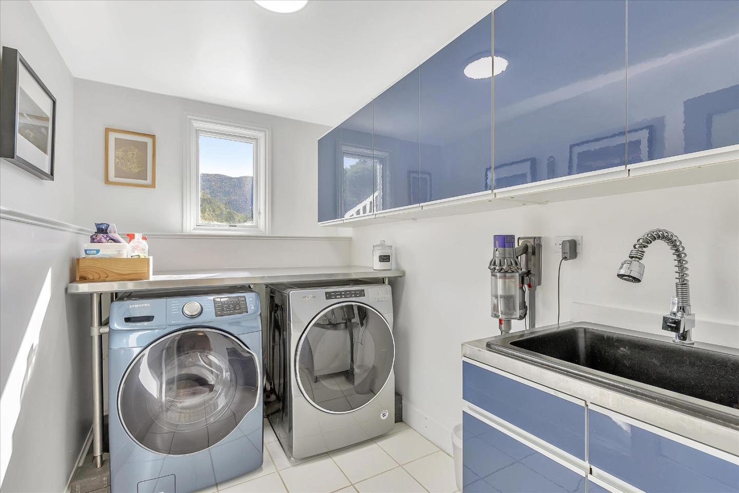 1261 Oddstad Boulevard Pacifica, CA 94044 - Photo 44 of 62 a utility room with sink dryer and washer