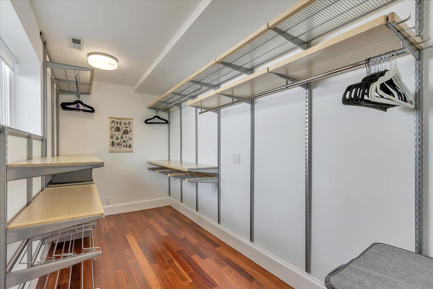 1261 Oddstad Boulevard Pacifica, CA 94044 - Photo 47 of 62 a view of walk in closet with clothes and shoes