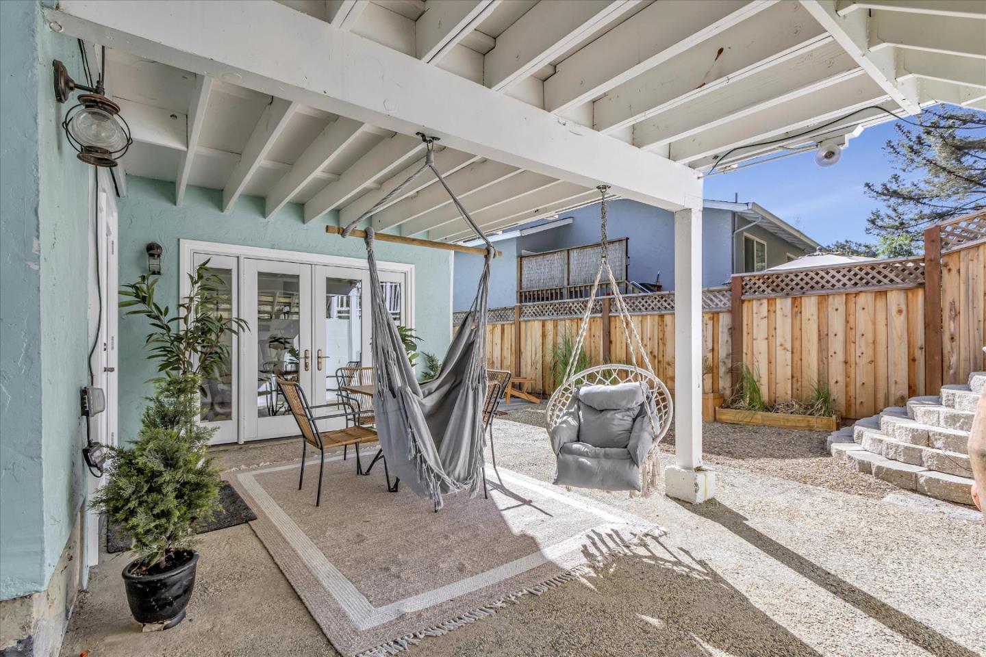 1261 Oddstad Boulevard Pacifica, CA 94044 - Photo 48 of 62 a view of a porch with furniture and garden