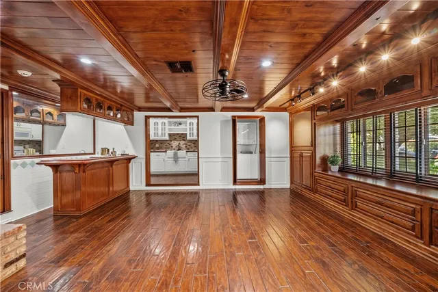 a bathroom with a bathtub toilet and shower