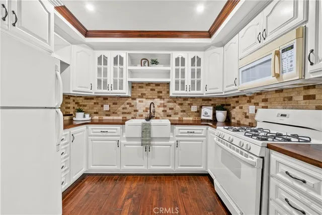 a bathroom with a mirror and a sink