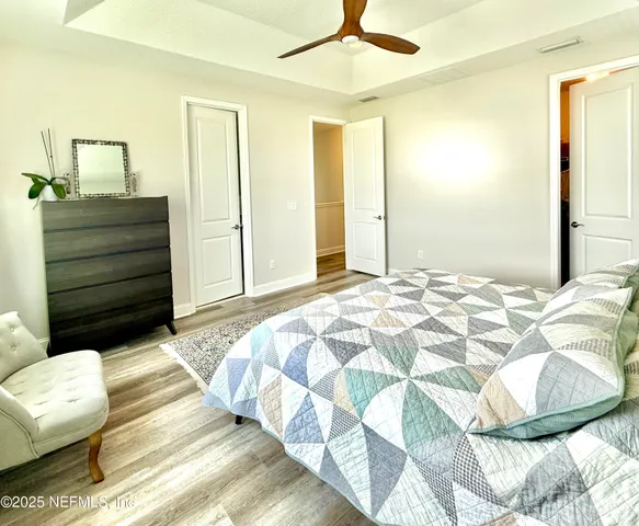 a bathroom with a tub a sink and a shower