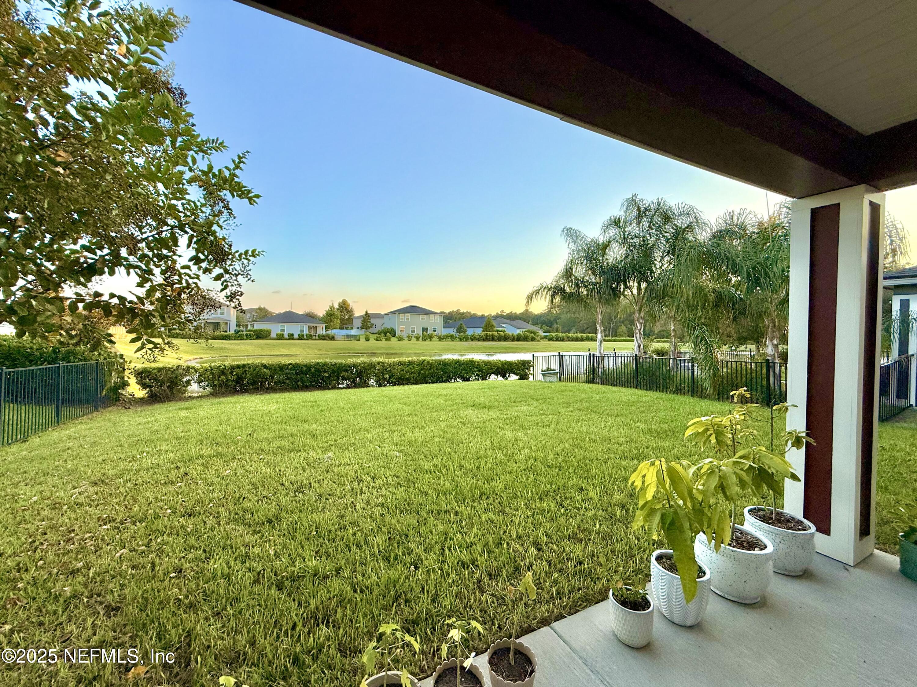 6887 Azalea Grove Drive Jacksonville, FL 32258 - Photo 30 of 35 a view of a garden with an outdoor space