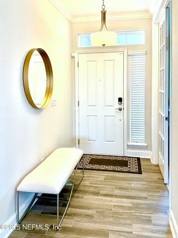 a view of a room with a table and chair