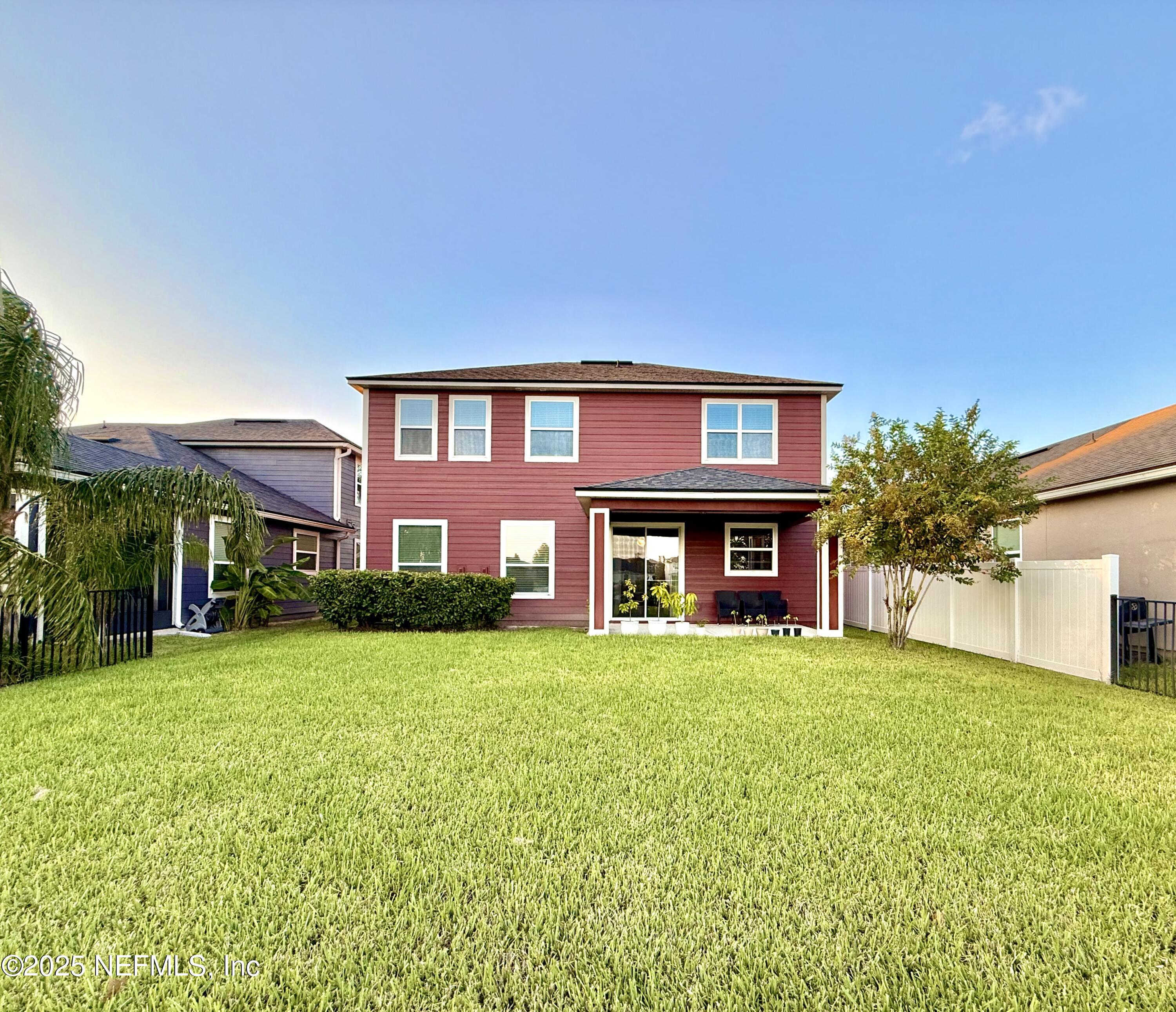 6887 Azalea Grove Drive Jacksonville, FL 32258 - Photo 33 of 35 a view of house with yard and front view of a house