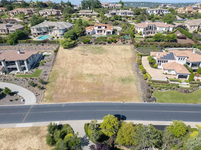 a view of a lake with a building in the background