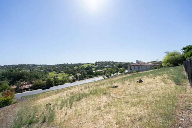 a view of a yard with an outdoor space