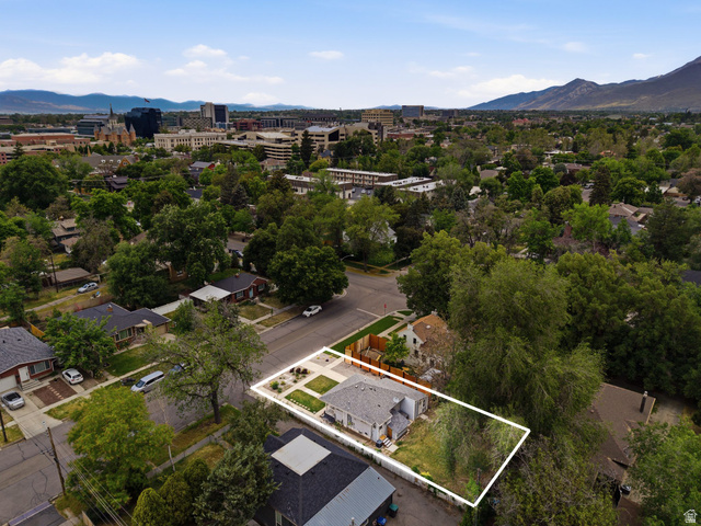 225 South 300 East Provo, UT 84606 - Photo 28 of 30 Aerial perspective showcasing a single-story residence with a white exterior and a gray shingle roof