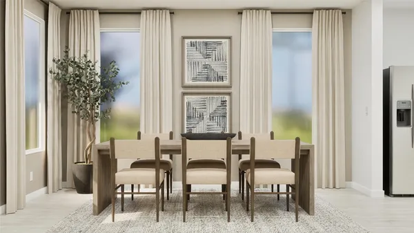 a view of a dining room with furniture and window