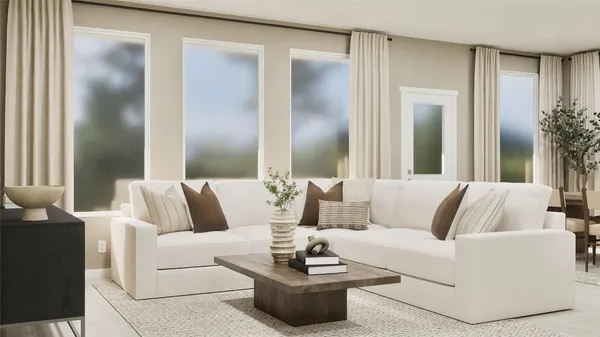 a living room with furniture and a large mirror