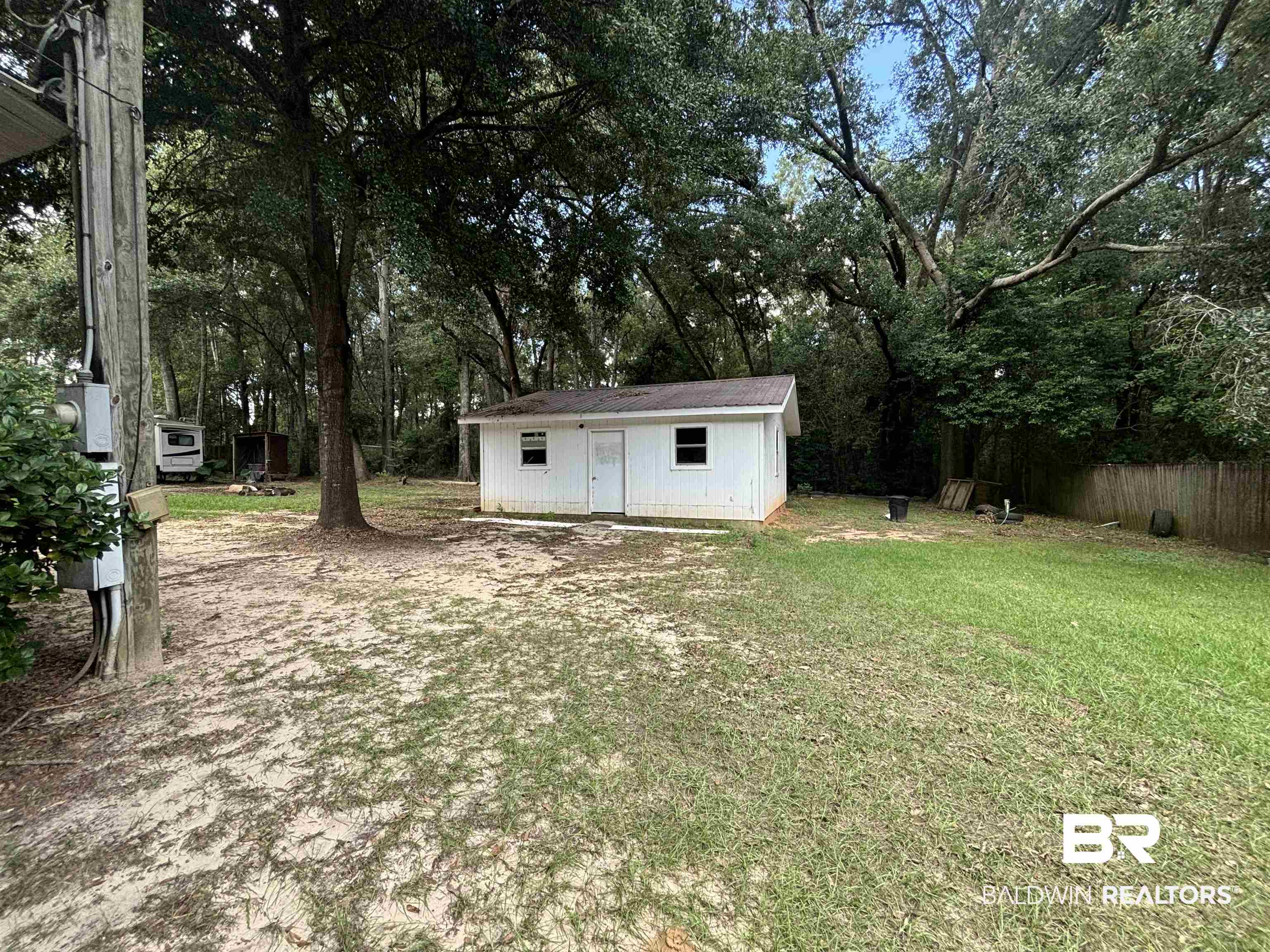 7700 Morris Hill Road Semmes, AL 36575 - Photo 3 of 9 View of yard featuring a storage shed